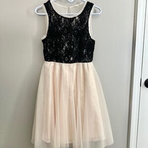 Beautiful black lace and nude tulle dress
